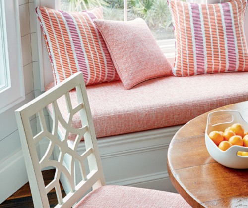 Breakfast nook with custom upholstered bench and chair