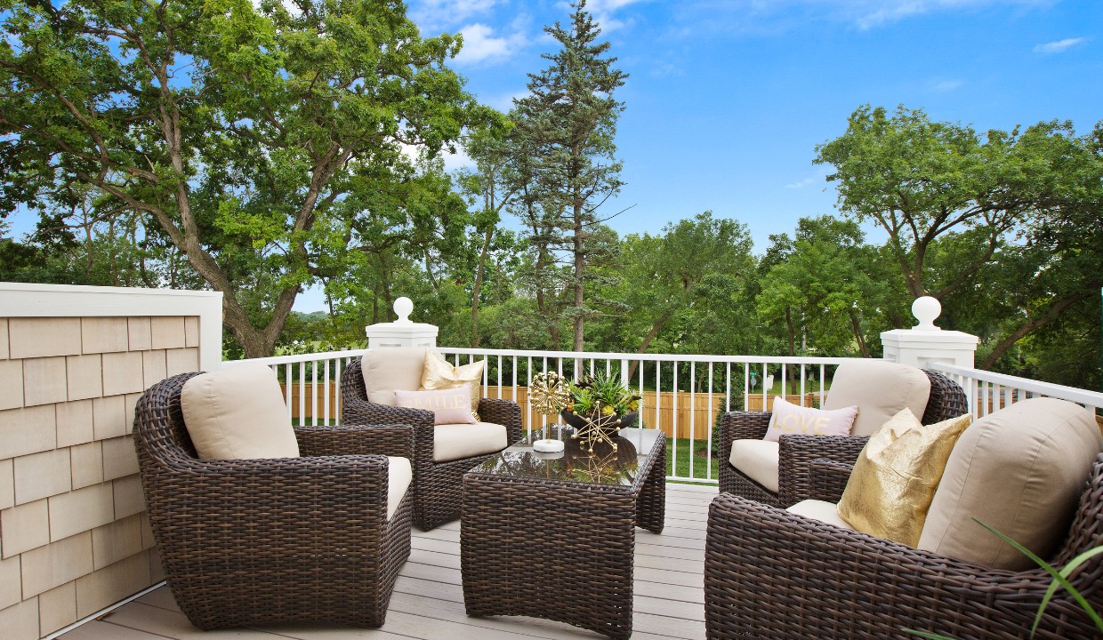Outdoor deck with comfy chairs in a group